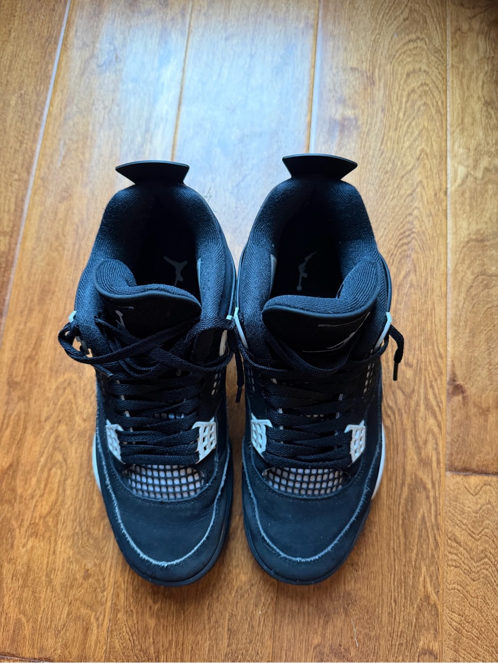 Nike Men’s Black White Jordan 4 Retro Sneakers